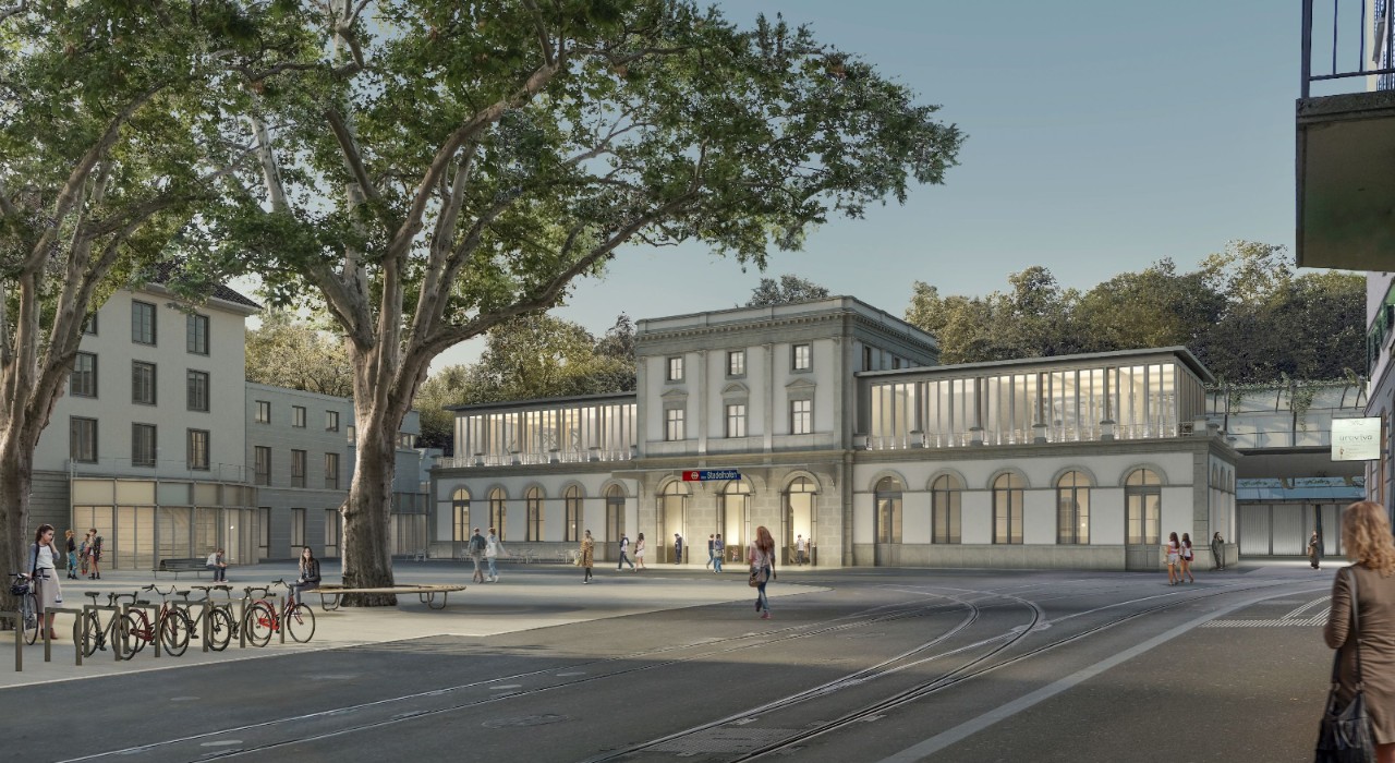 Visualisierung der geplanten Erweiterung des Bahnhofsgebäude Zürich Stadelhofen mit Aufbauten auf den Seitenflügeln und ebenerdigem Zugang.